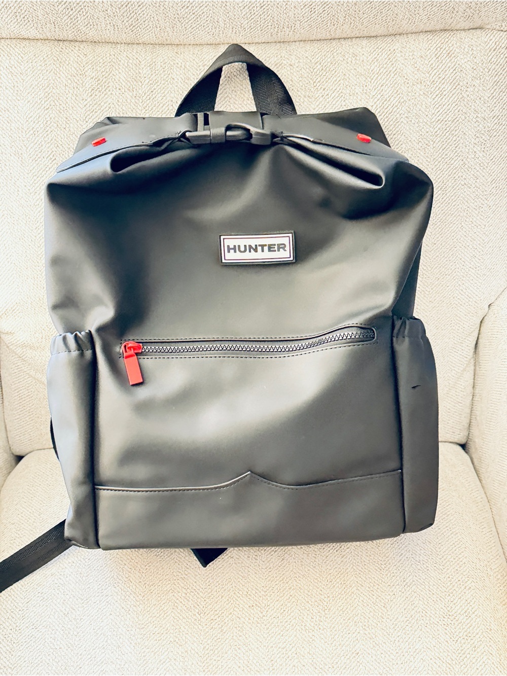 Hunter Black Roll-Top Backpack with Red Accents